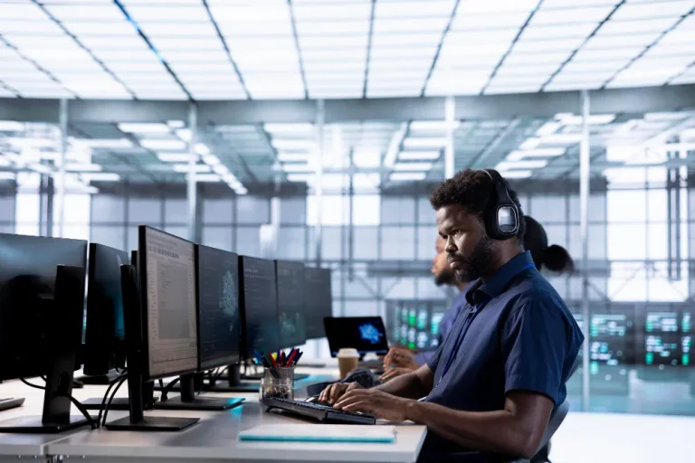 EnvisionIT technician testing a business internet connection for a Greater Jackson Area logistics office